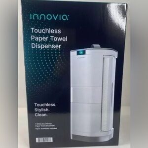 Automatic paper towel dispenser - open box but product is brand new